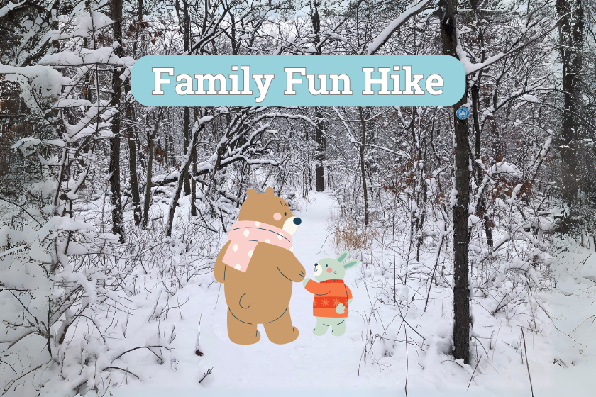A photo of a snow covered path with trees with a graphic of two animals walking and the words Family Fun Hike